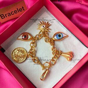 Schiaparelli gold bracelet
